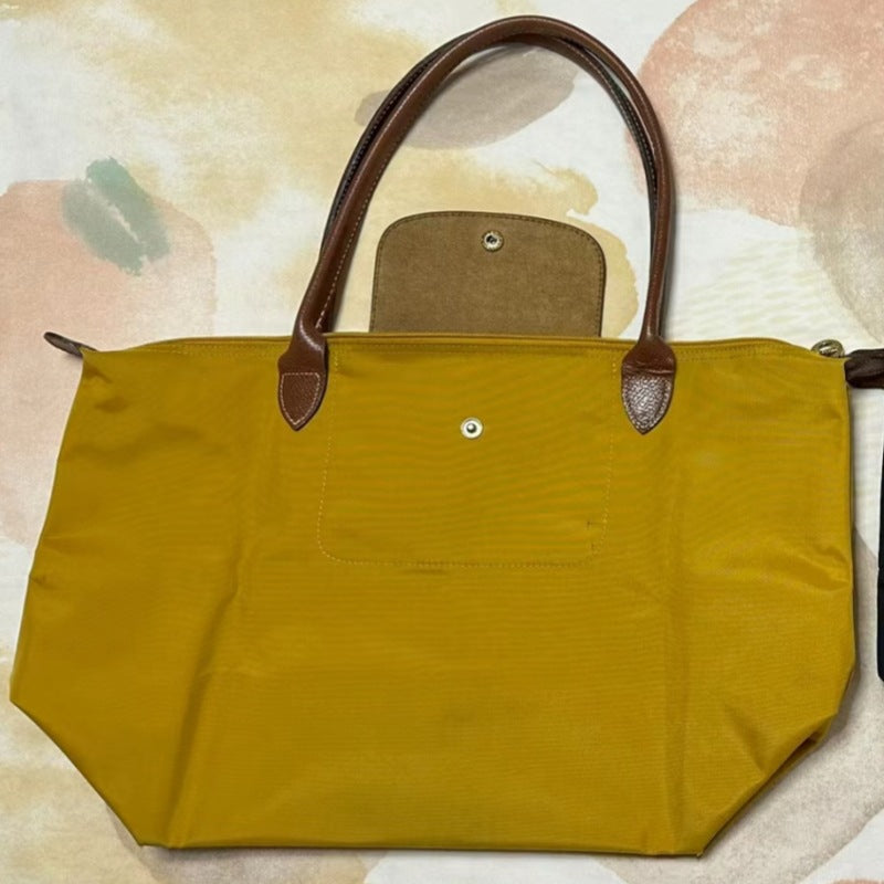 French-Inspired Embroidered Dumpling Bag